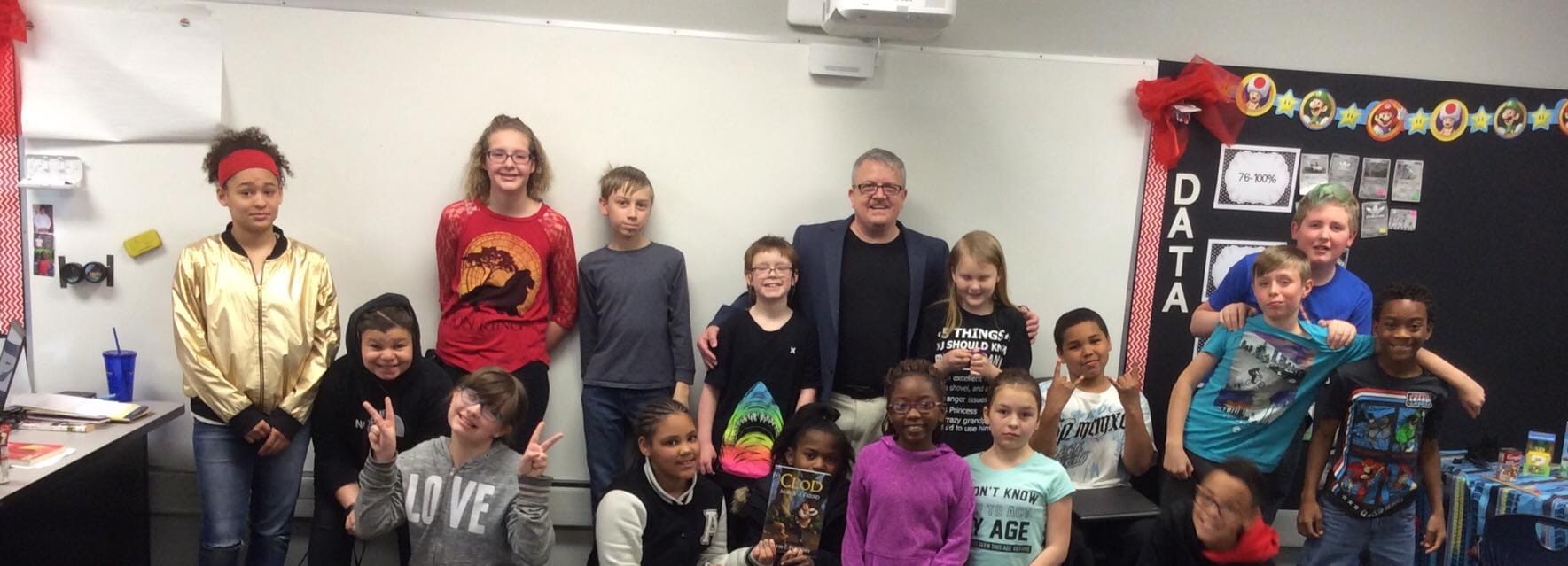 RE2 Standing with students from Randall Elementary